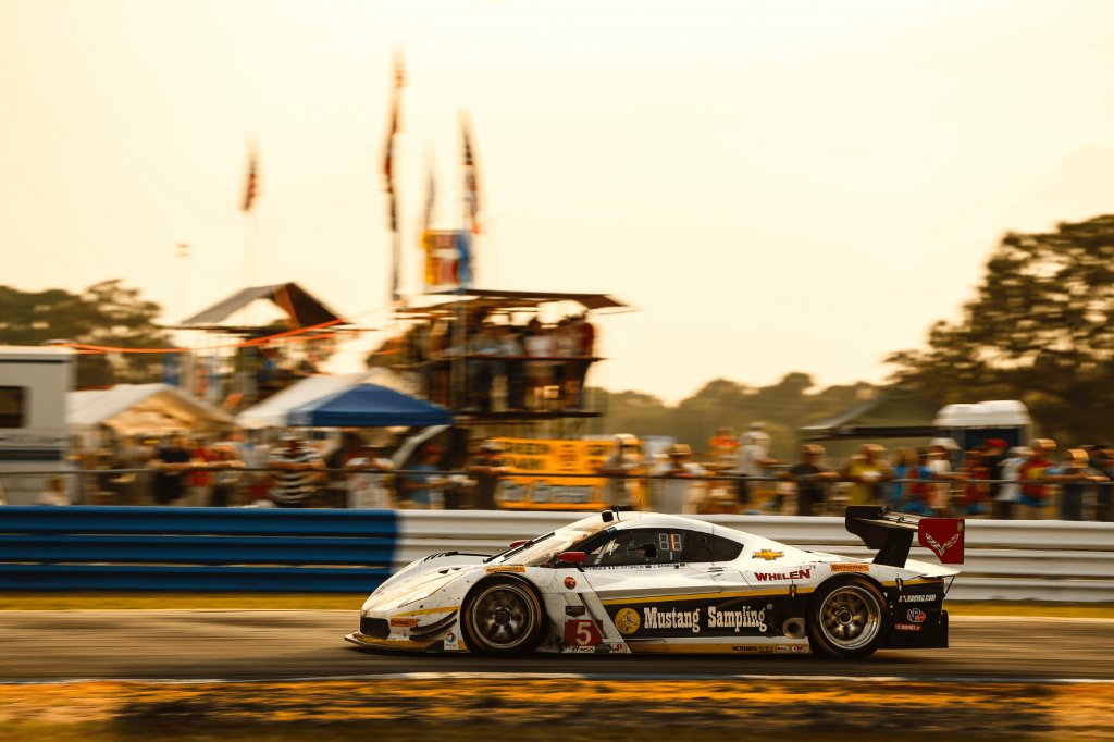 White car at high speed on the track