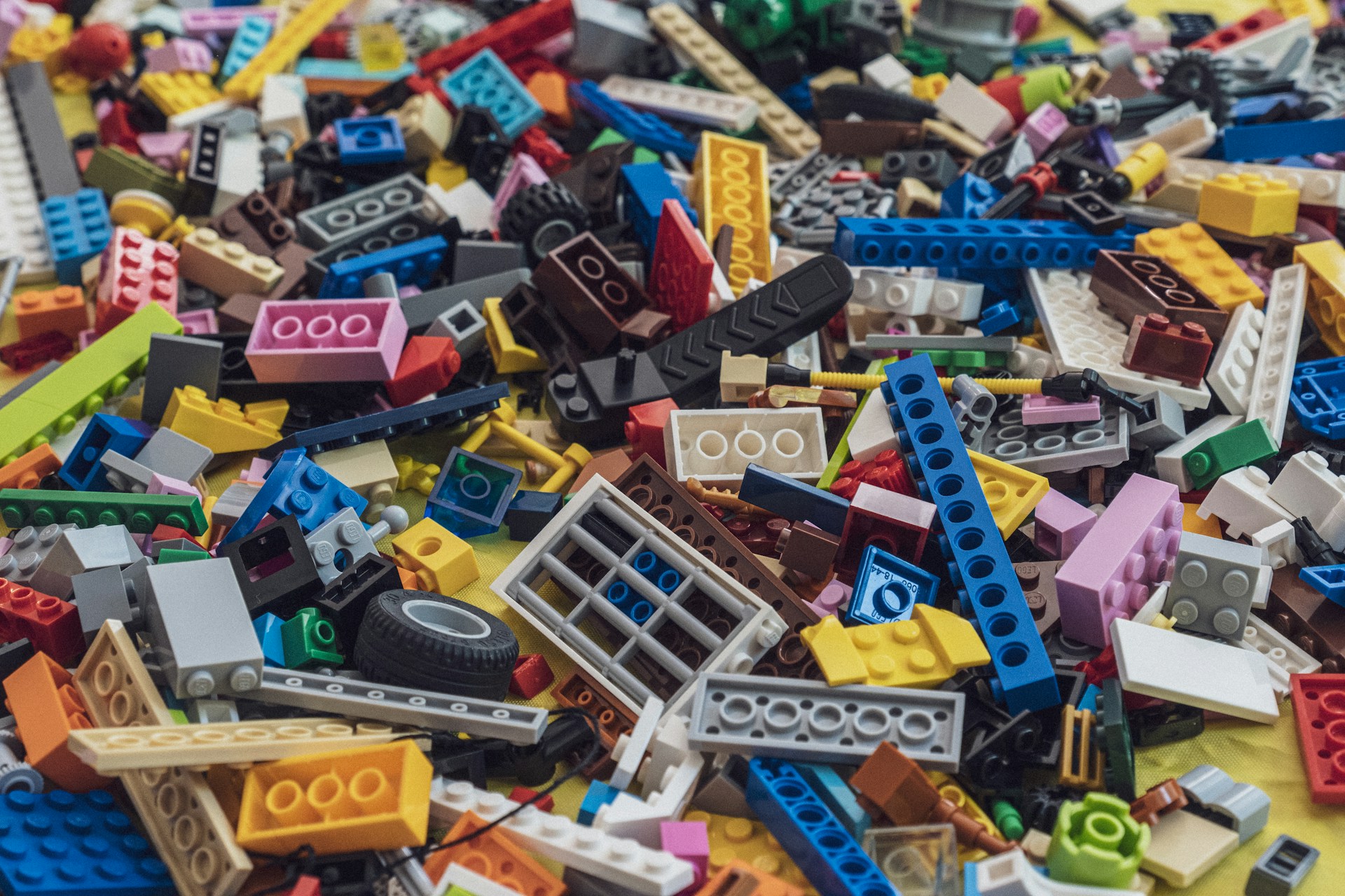 Closeup of large pile of assorted Lego building blocks