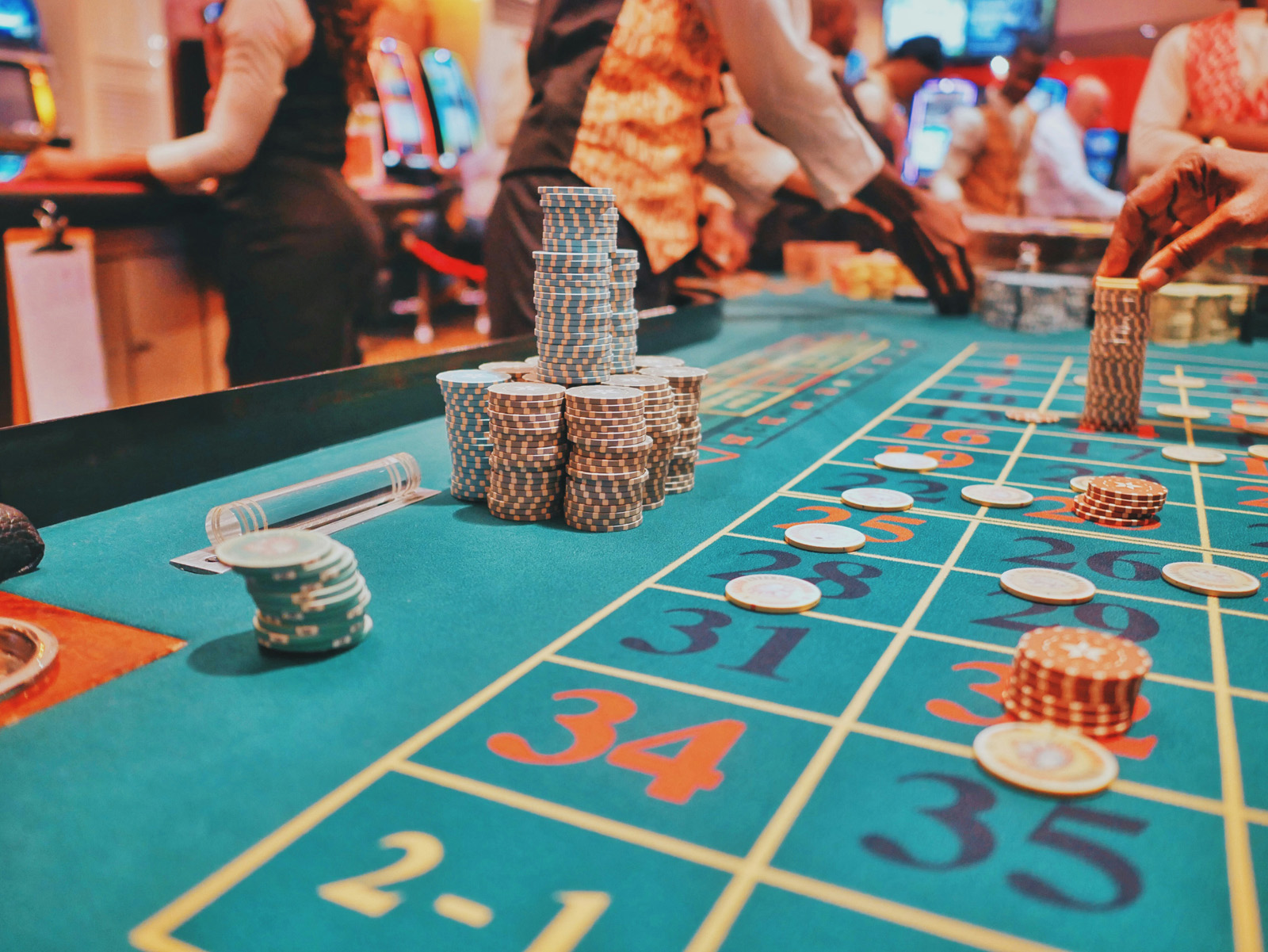 Close up of roulette table stacked with cheques