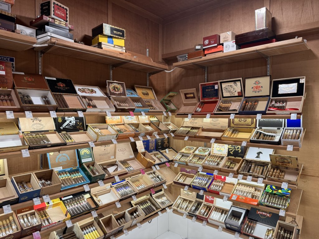 Humidity controlled room showcasing the variety of cigars the establishments carries.