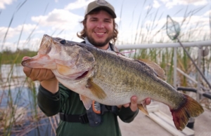 Man holding large bass fish